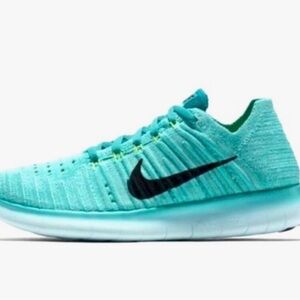 Nike women’s Free Flyknit running sneaker - size 9. Hyper turquoise.